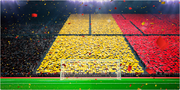 voetbalstadion gevuld met supporters die de kleuren van de Belgische vlag omhoog houden